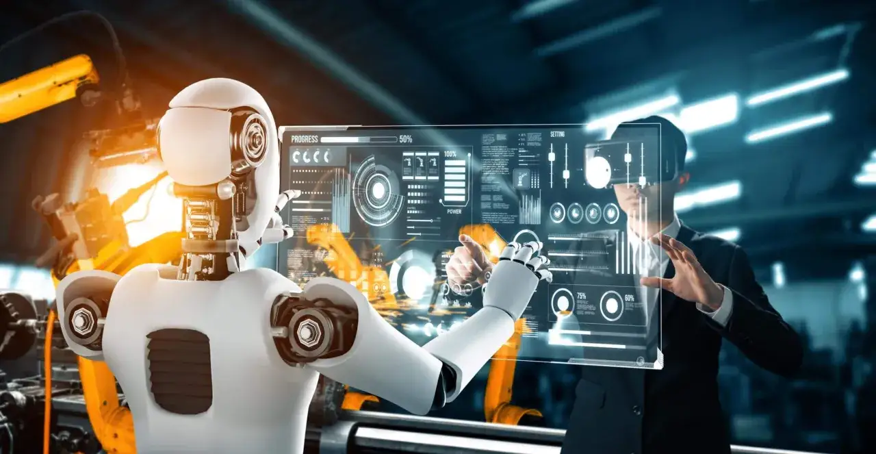 Robot y humano interact&uacute;an con pantalla hologr&aacute;fica, mostrando el futuro de las herramientas digitales en la industria.